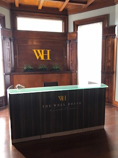 The Well House Spa for Beauty and Wellness Treatments - Reception Desk with Sign 3 1 - A collection of Spa, beauty, and other wellness treatments inspired to help you lead a happier, healthier life. The Well House Spa for Beauty and Wellness Treatments - Reception Desk with Sign 3 1 - A collection of Spa, beauty, and other wellness treatments inspired to help you lead a happier, healthier life.